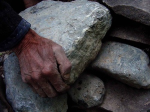 Hand laying stone
